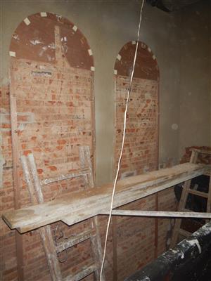 The original brick walls of the main building are exposed as part of the present structure. 